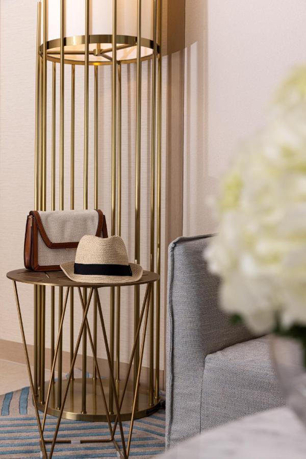 Jumeirah Gulf Of Bahrain Manama Exterior photo A hat on a table